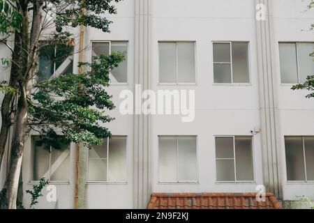 Retro old white building exterior in Japan Stock Photo