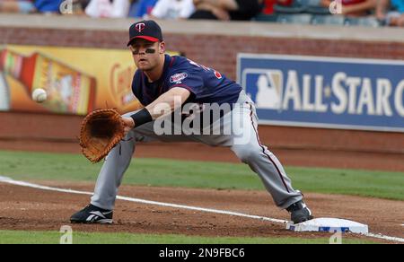 Twins first baseman Justin Morneau #33 warming up prior to the