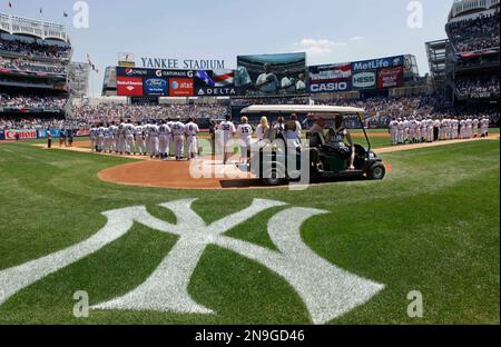 Former New York Yankees players, including Mariano Rivera, center, pose for  a picture during Old Timer's Day at Yankee Stadium, Sunday, June 23, 2019,  in New York. (AP Photo/Seth Wenig Stock Photo 