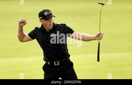 Jamie Donaldson from Wales reacts on the 18th green after winning the Irish Open Golf Championship at Royal Portrush Golf Club, Portrush, Northern Ireland, Sunday, July 1, 2012. (AP Photo/Peter Morrison)
