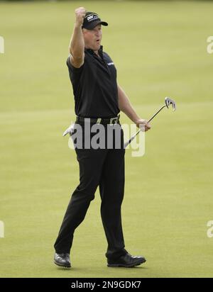 Jamie Donaldson from Wales reacts on the 18th green after winning the Irish Open Golf Championship at Royal Portrush Golf Club, Portrush, Northern Ireland, Sunday, July 1, 2012. (AP Photo/Peter Morrison)