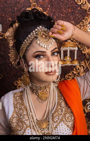 Pakistani. Indian Beautiful bride makeup for saloon shoot Stock Photo