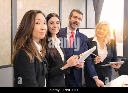 successful multiethnic company with happy workers Stock Photo