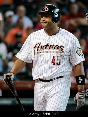 Houston Astros's Carlos Lee (45) during the first inning of a baseball game  against the Washington Nationals Tuesday, June 1, 2010 in Houston. (AP  Photo/David J. Phillip Stock Photo - Alamy