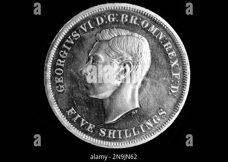 Obverse of a 1951 Festival of Britain five shilling crown coin featuring King George VI coin portrait by Thomas Humphrey Paget Stock Photo