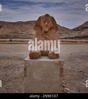 Sphinx of Hatshepsut  at entrance  of Temple of Hatshepsut . This colossal sphinx portrays female pharaoh Hatshepsut with body of a lion & human head Stock Photo