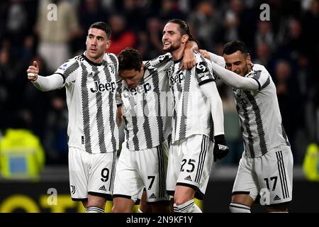 Dusan Vlahovic of Juventus and Christiano Biraghi of Acf Fiorentina during  the Italian serie A, football match between Juventus Fc and Acf Fiorentina  on 12 February 2023 at Allianz Stadium, Turin, Italy.