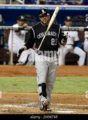 Colorado Rockies' Jason Giambi (23) reacts swinging for a strike