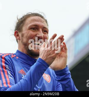 Elland Road, Leeds, Yorkshire, UK. 12th Feb, 2023. Premier League Football, Leeds United versus Manchester United; Leeds United's Luke Ayling applauds the Leeds fans during the pre-match warm-up Credit: Action Plus Sports/Alamy Live News Stock Photo