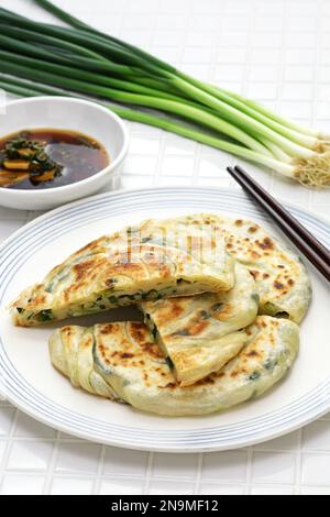 Homemade Chinese green onion pancakes. The inside is layered. Stock Photo