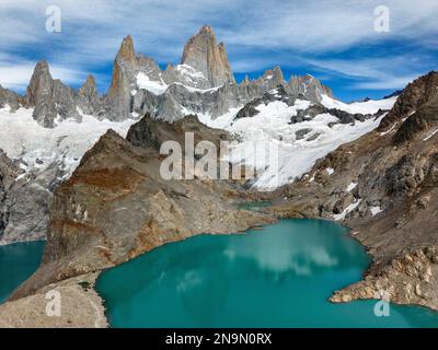 Aerial view of the stunning Laguna de los Tres and Laguna Sucia with their turquoise waters surrounded by Mount Fitz Roy and icefields Stock Photo