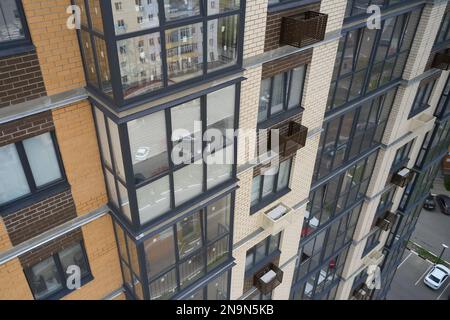 Building exterior with decorative air conditioner covers Stock Photo
