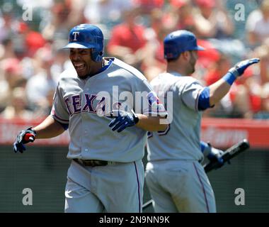 Texas Rangers Nelson Cruz celebrates his seventh inning home run