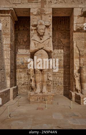 Mortuary Temple of Ramesses III at Medinet Habu in Luxor, Egypt daylight view showing Ramessid columns in the peristyle court (first courtyard) Stock Photo