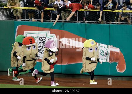 The Great Pierogi Race ends with Sauerkraut Saul winning between innings of  a baseball game between the Pittsburgh Pirates and Cincinnati Reds in  Pittsburgh Tuesday, May 29, 2012. The race has been