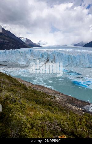 The famous glacier and natural sight Perito Moreno with the icy waters of Lago Argentino in Patagonia, Argentina, South America Stock Photo