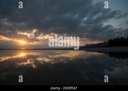 Calm waters at sunrise over the Alexandra Reefs, Queensland, Australia; Port Douglas, Queensland, Australia Stock Photo