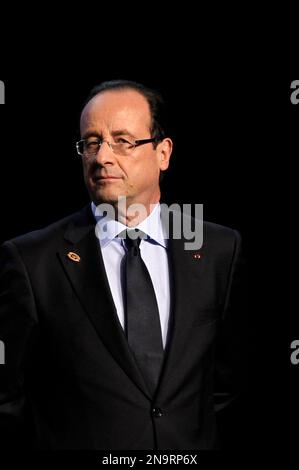 French President Francois Hollande poses for a photo during NATO Summit in Chicago, Monday, May 21, 2012. (AP Photo/Christophe Ena)