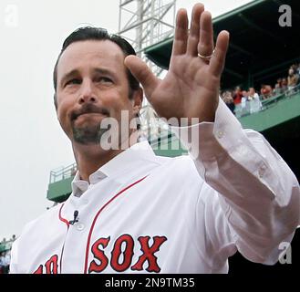 Boston Red Sox pitcher Tim Wakefield reacts following a home run hit by  Tampa Bay Devil Rays designated hitter Jonny Gomes at Fenway Park in Boston  on April 20, 2006. Tampa Bay