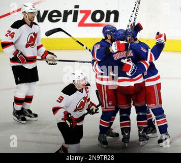 New Jersey Devils' Bryce Salvador, top, punches Tampa Bay Lightning's Zenon  Konopka (28) during a second-period fight an NHL hockey game Thursday, Oct.  8, 2009, in Tampa, Fla. (AP Photo/Chris O'Meara Stock