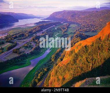 River running through a gorge in an autumn coloured mountainous landscape Stock Photo