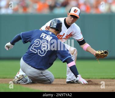 Baltimore Orioles shortstop J.J. Hardy (2) slides into third base