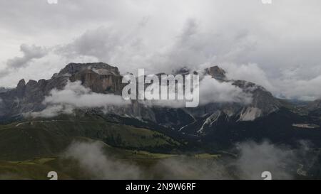 The mountain peaks of Italian Dolomites hiding behind the fog Stock ...