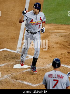 St. Louis Cardinals' Carlos Beltran celebrates at home after