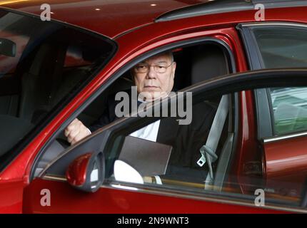 Former Secretary of State Colin Powell gets ready to valet his car as he arrives ahead of Britain's Prince Harry at the Atlantic Council Annual Awards Dinner in Washington, Monday, May 7, 2012. (AP Photo/Charles Dharapak)