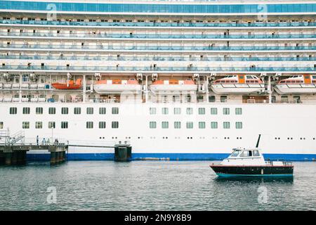 Cruise ship docked in the capital city of Roseau, Dominica; Roseau, Dominica, West Indies Stock Photo