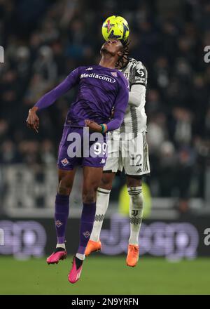 Christian Kouame of ACF Fiorentina and Alex Sandro of Juventus FC compete  for the ball during the Serie A football match between Juventus FC and ACF  Stock Photo - Alamy