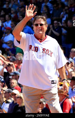 A Boston Red Sox fan waves a Jarrod Saltalamacchia jersey before