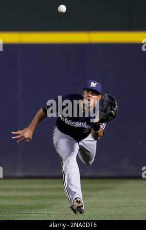 Milwaukee Brewers center fielder Carlos Gomez (27) lays down a