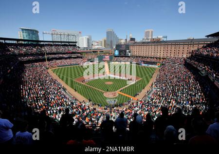 Baltimore Orioles players stand for the National Anthem of Canada and the  United States prior to the start of the Toronto Blue Jays at Baltimore Orioles  spring training baseball game at Ed