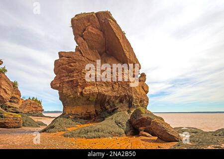 Jagged Sea Stack at Low Tide in the Rocks Provincial Park in New Brunswick Stock Photo