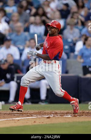 Philadelphia Phillies' Juan Pierre hit an infield single in the