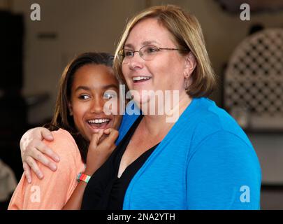 Jo Anne Yeager Sallah, right, a relief worker stationed in Gambia ...