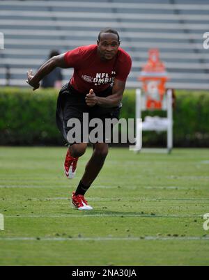 Wide receiver Alshon Jeffery performs a drill as scouts look on during ...