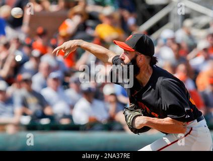 San Francisco Giants closer Brian Wilson pitches in the ninth