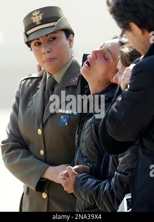 Nunzia the wife of the Italian soldier Michele Silvestri center