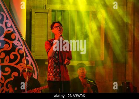 Javanese performing keroncong music. Keroncong is one of  music genre from Indonesia Stock Photo