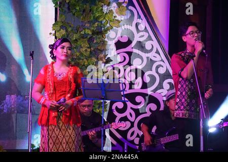 Javanese performing keroncong music. Keroncong is one of  music genre from Indonesia Stock Photo