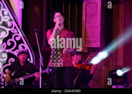 Javanese performing keroncong music. Keroncong is one of  music genre from Indonesia Stock Photo