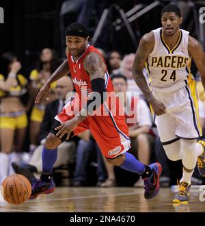 Indiana Pacers forward Paul George dunks during the first quarter against  the Chicago Bulls at the United Center in Chicago on March 24, 2014.  UPI/Brian Kersey Stock Photo - Alamy