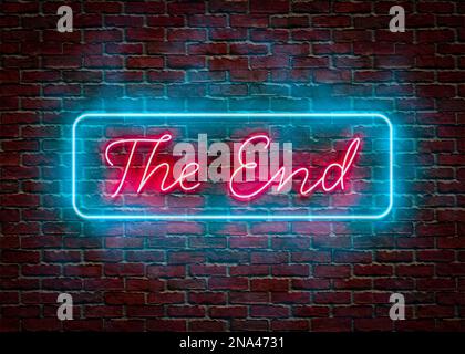 The End Neon Sign on a red brick wall Stock Photo
