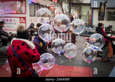 Plastic balloons for sale in Luoyang Old Town District,  Henan Province, China © Dosfotos/Axiom Stock Photo