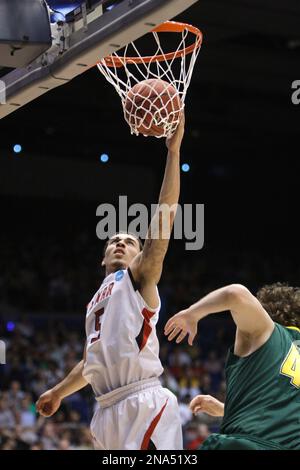 Lamar guard Mike James in action against Vermont in an NCAA First Four  college basketball tournament game, Wednesday, March 14, 2012, in Dayton,  Ohio. (AP Photo/Al Behrman Stock Photo - Alamy