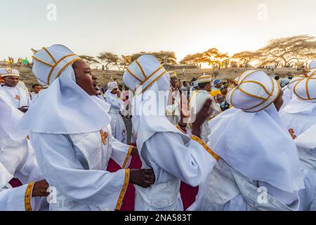 People in a Timkat procession during the Orthodox Tewahedo celebration of Epiphany, celebrated on January 19th; Bulbula, Oromia, Ethiopia Stock Photo