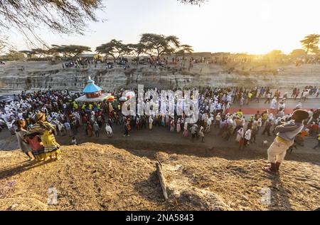 People in a Timkat procession during the Orthodox Tewahedo celebration of Epiphany, celebrated on January 19th; Bulbula, Oromia, Ethiopia Stock Photo