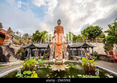 Statue of Buddha at Brahma Vihara Arama Buddhist Monastery; Banjar, Bali, Indonesia Stock Photo